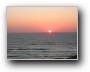 Wolkenloser Traum-Sonnenuntergang   
